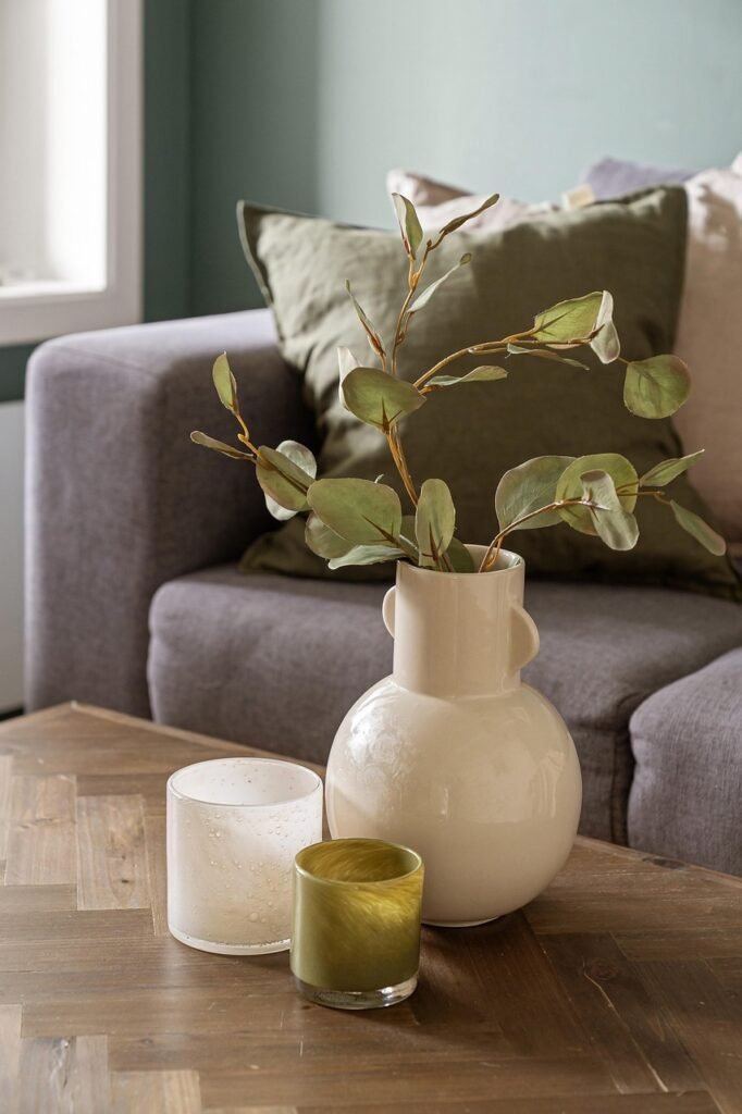 sofa, living room, interior, house, real estate, luxury, table, chair, decor, pillows, window, art, design